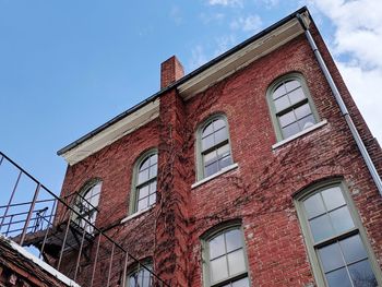 Low angle view of old building against sky