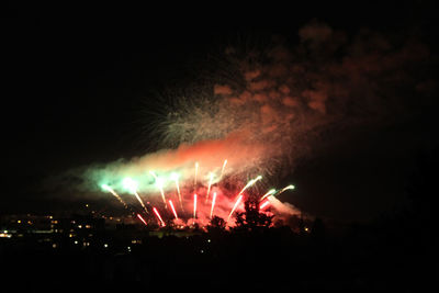 Firework display at night