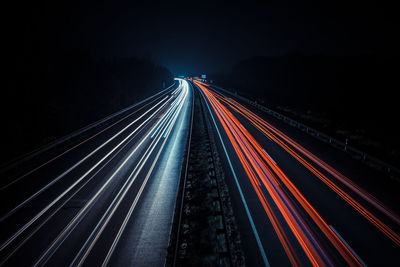 High angle view of light trails on highway