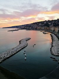 Aerial view of sea port against dramatic sky