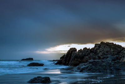 Scenic view of cloudy sky at sunset