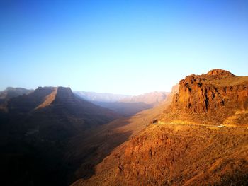 Scenic view of mountains against clear sky