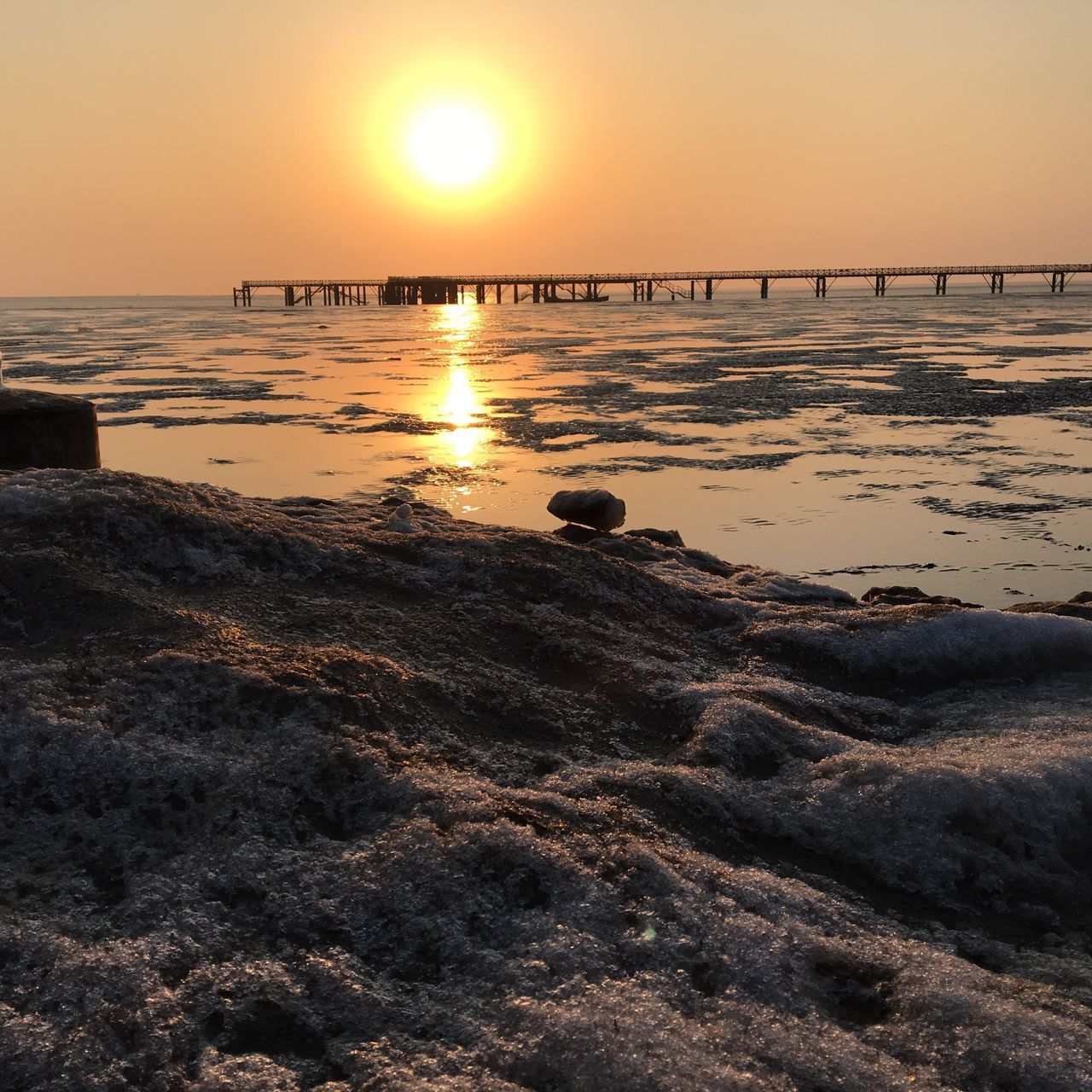 sunset, sun, water, sea, tranquil scene, scenics, tranquility, beauty in nature, reflection, orange color, horizon over water, beach, sunlight, nature, idyllic, sky, shore, silhouette, lens flare, sunbeam