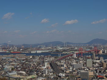 High angle view of buildings against sky in city