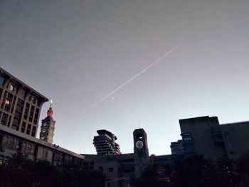 Low angle view of buildings against clear sky