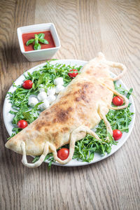 Close-up of salad served on table