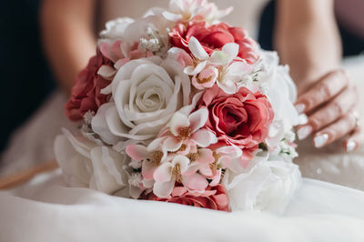 Wedding bouquet with red and white roses