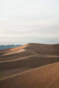 Scenic view of desert against sky