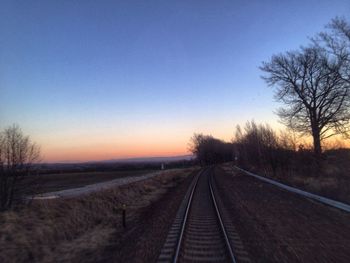 Railroad track at sunset