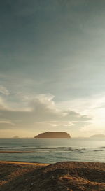 Scenic view of sea against sky at sunset