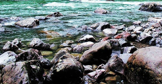 water, sea, rock - object, nature, rock, high angle view, shore, tranquility, beauty in nature, scenics, tranquil scene, rock formation, beach, surf, stone - object, day, outdoors, stone, no people, wave