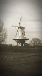 Wind turbines in field