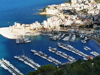 High angle view of boats moored in harbor