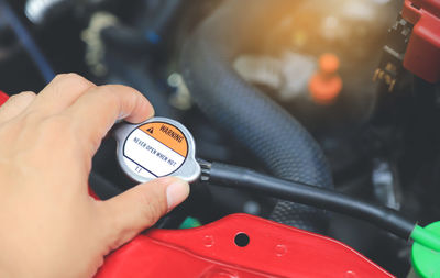 Close-up of person holding camera