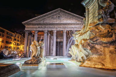 Fountain by pantheon at night