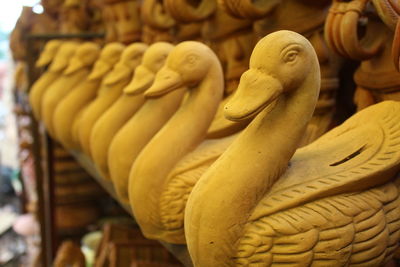 Close-up of duck sculptures for sale