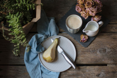 High angle view of fruits in plate on table