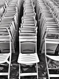 Stack of chairs in row