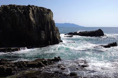 Scenic view of sea against clear blue sky