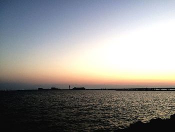 Scenic view of sea at sunset