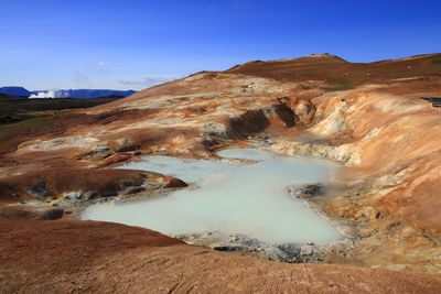 Scenic view of volcanic landscape against sky