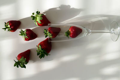 High angle view of strawberries on table