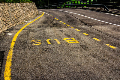 High angle view of text on road