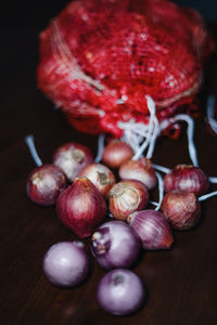 Fresh onion in malaysia during preparation of eid mubarak  on a wooden textured background