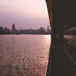 Scenic view of river against sky during sunset