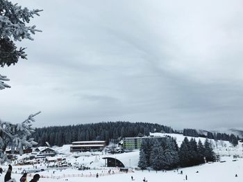 Scenic view of landscape against sky during winter