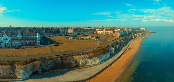 High angle view of beach against blue sky