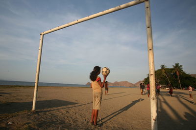 Woman standing on beach