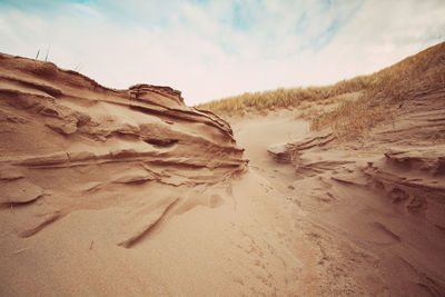 Scenic view of desert against sky