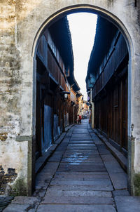 Narrow street amidst buildings in old town