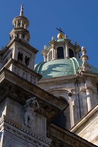 Low angle view of building against blue sky