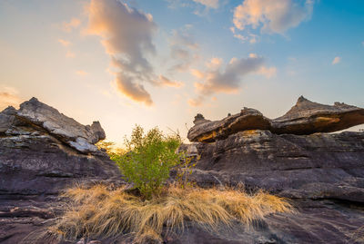 Scenic view of rocky mountains against sky during sunset