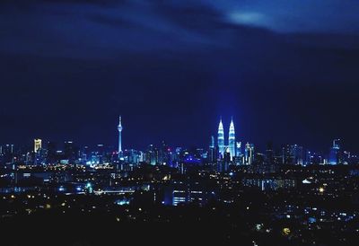 Illuminated cityscape at night