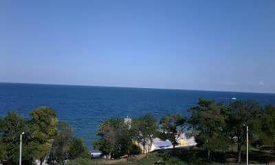 Scenic view of sea against clear sky