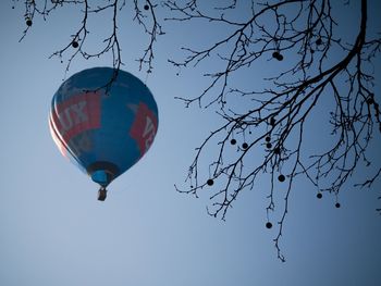Low angle view of hot air balloon against clear sky