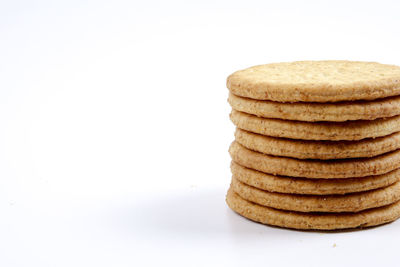 Stack of bread against white background