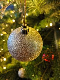 Close-up of christmas decoration hanging on tree