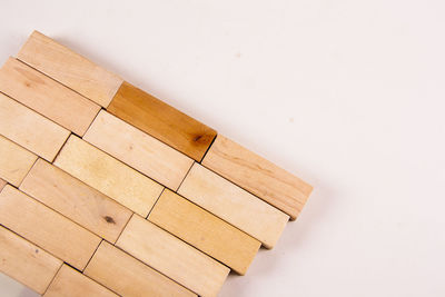 High angle view of wooden table against white background