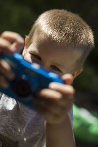 Cropped image of man holding baby