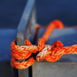Close-up of rope tied on metal