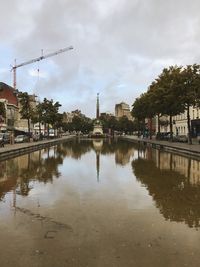 Reflection of buildings in puddle