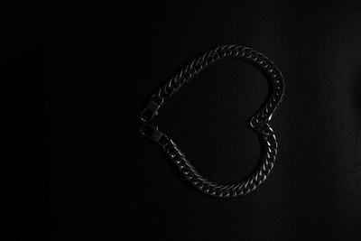 Close-up of metal against black background