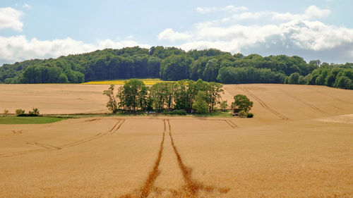 Scenic view of land against sky