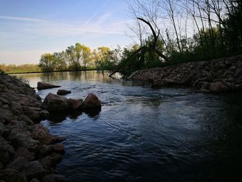 Scenic view of river against sky