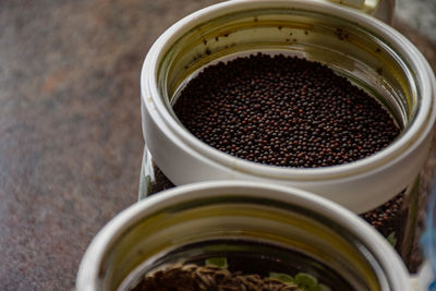 High angle view of coffee in jar on table