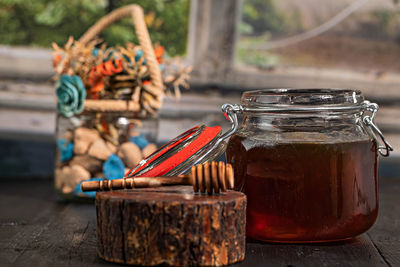 Close-up of glass jar on table